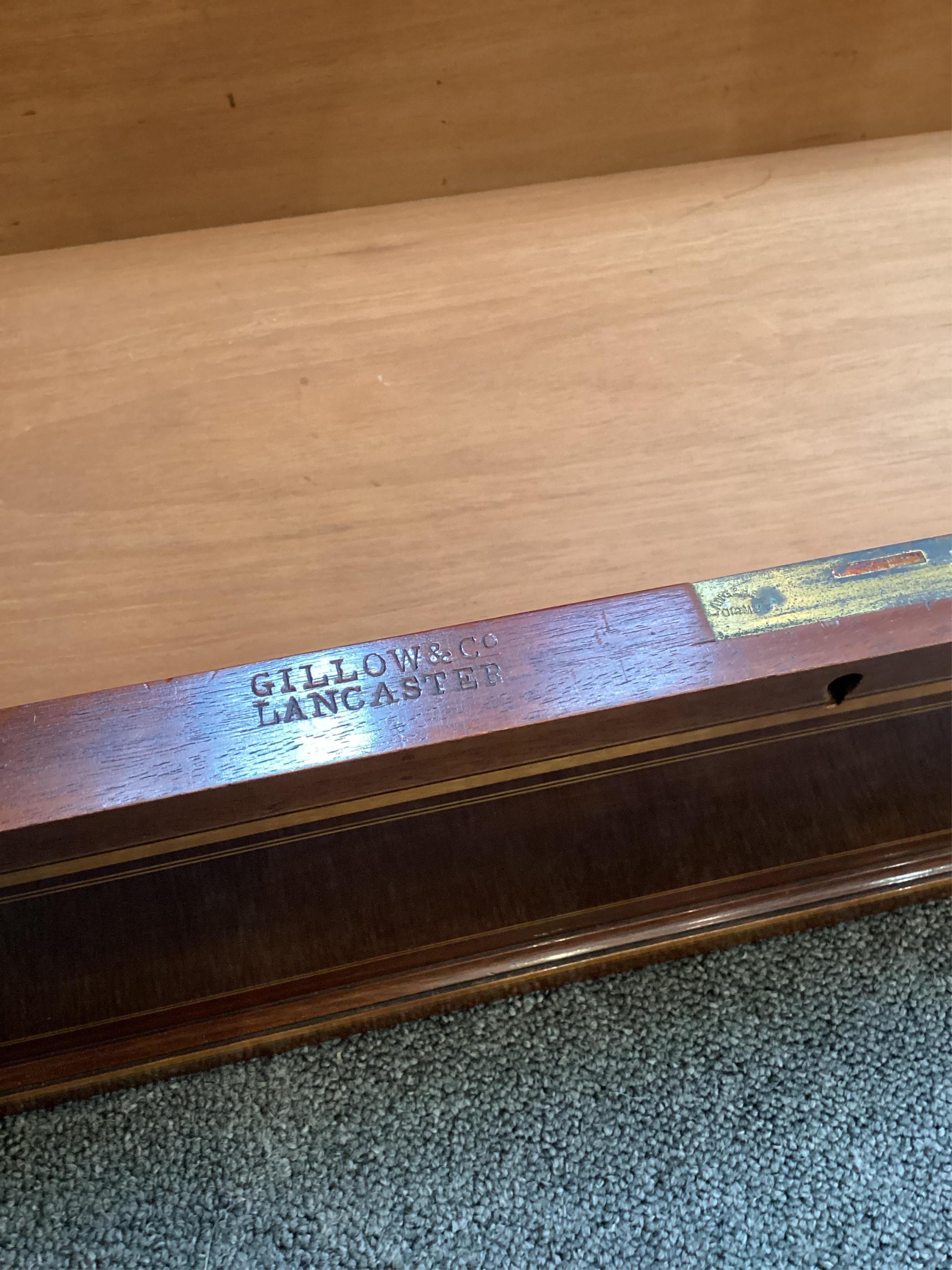 A pair of Edwardian marquetry inlaid and satinwood banded mahogany side cabinets, by Gillows